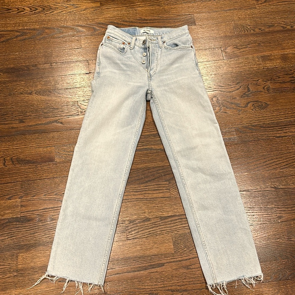 Redone size 25. raw hem. good shape. light wash
